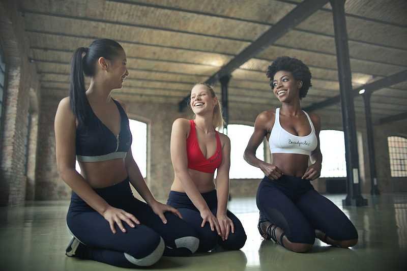 Three girls at the gym having a good time